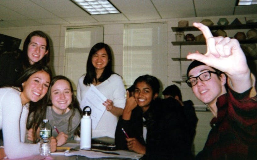 Sophie Chen with her students prior to the pandemic