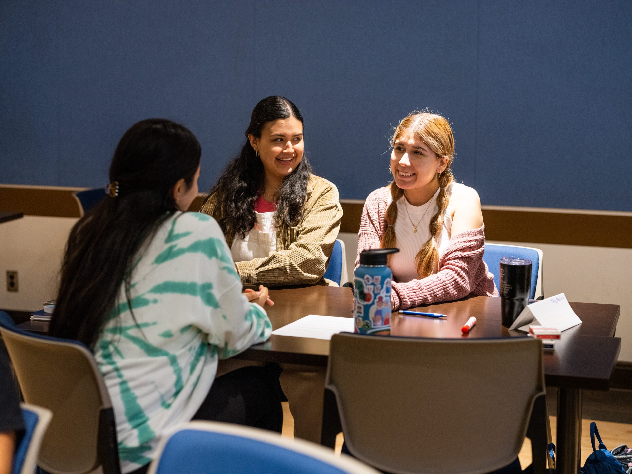 Three UCLA Students in Classroom