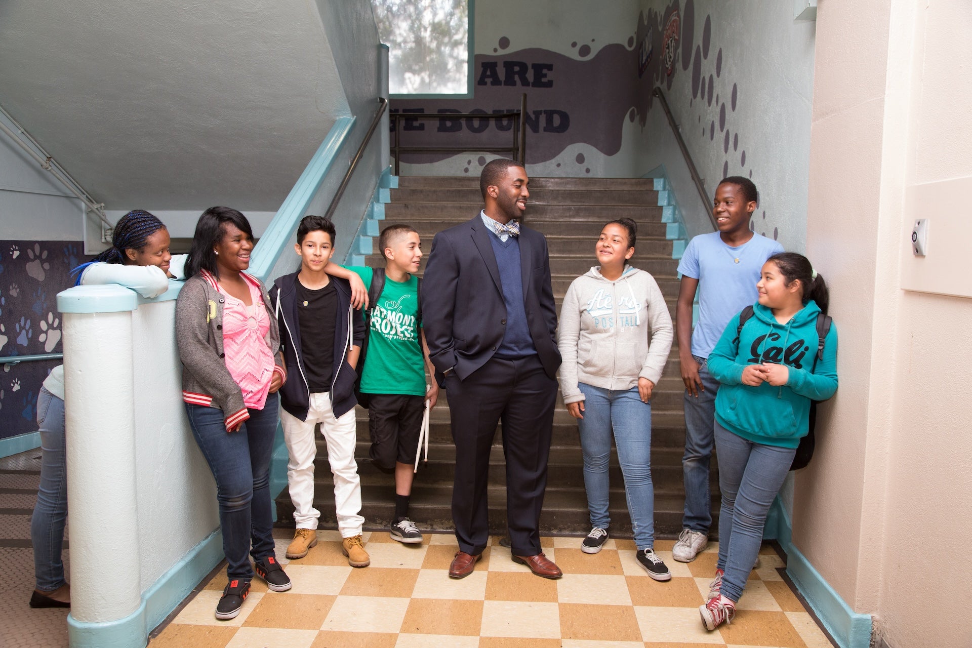 Principal Orlando Johnson with Mann Community School Students