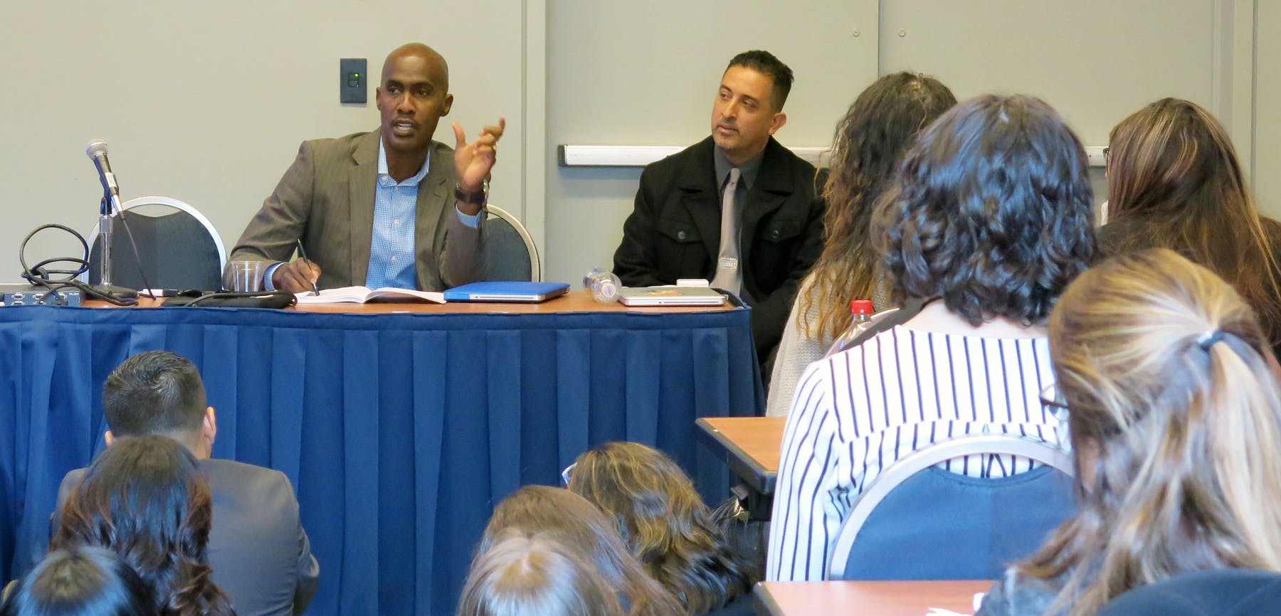 Professor Tyrone Howard (at left) and HEOC alumnus Luis Giraldo, 