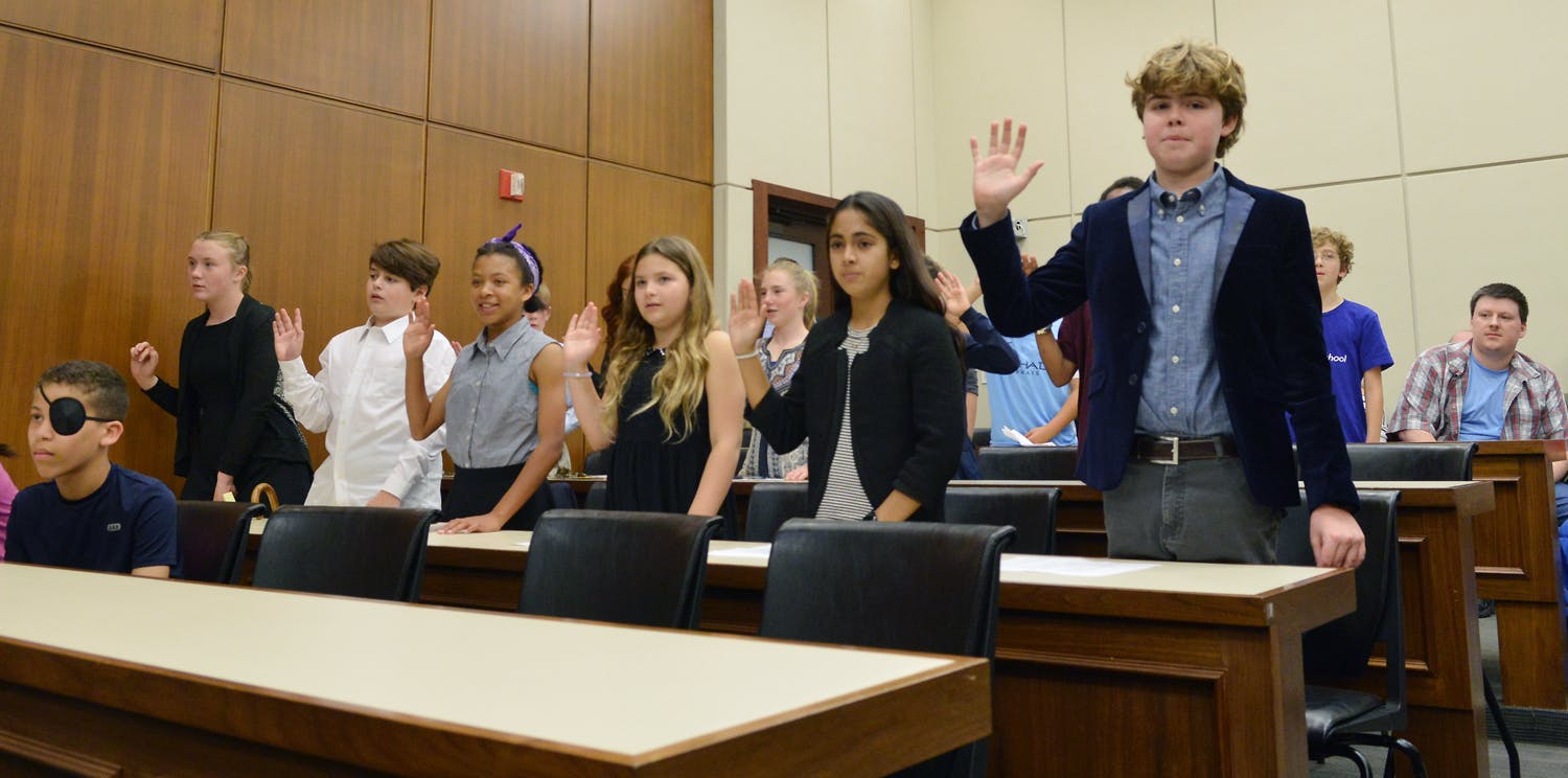 UCLA Lab School sixth graders were sworn in to uphold the facts. L-R: Ava Dyborn, Emmet Wasserman, Sophie Haynes, Annie Feldmar-DeVitre, Sofie Naidu, and Sam Sacket