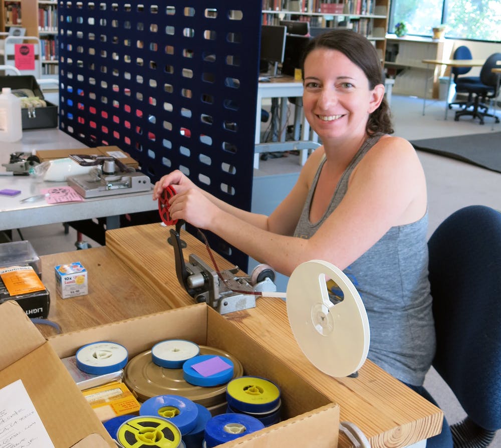 Jen O'Leary, a second-year MIAS student, prepares films for UCLA's first-ever Home Movie Day.