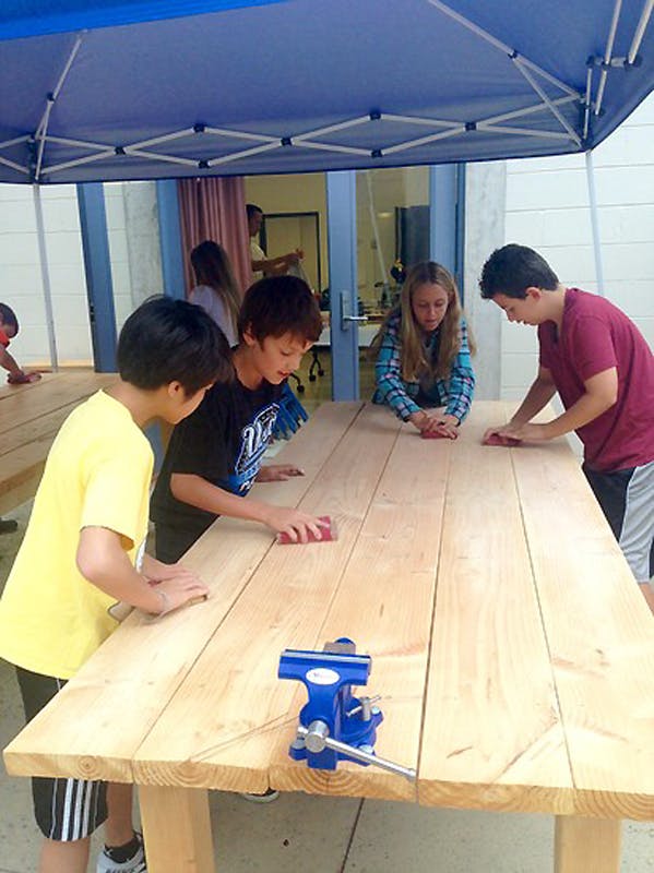 Upper level students built     Upper level students used math and engineering skills to build tables for the new iSTEAM area.