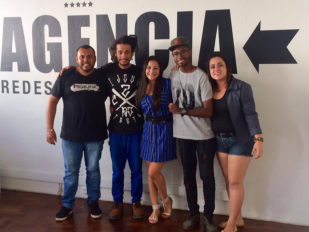 UCLA graduate student Veriene Melo (at center) interviewed former participants of the Agência program for her research on better pathways for favela youth. L-R: Renan Stork and Maicon Macô from Santa Cruz, followed by Junior Sant'ana and Aline Copelli from Batan.