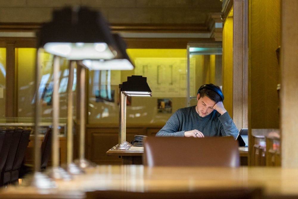 College student studying in library