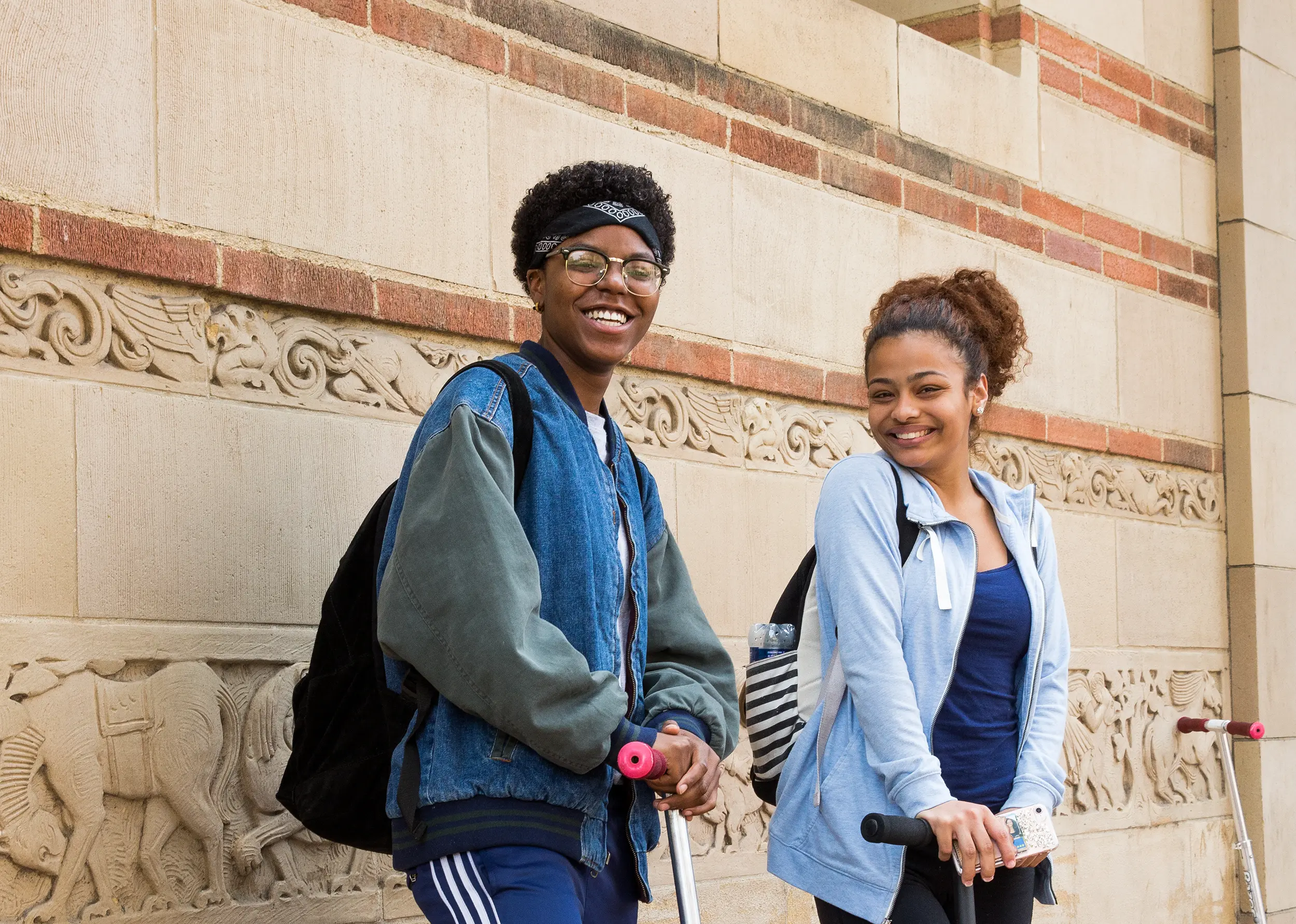 UCLA students with scooters