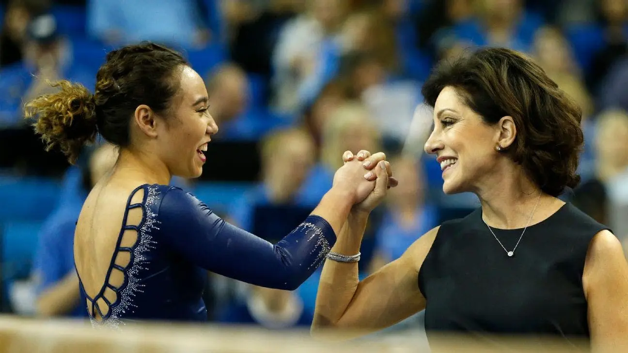 Valorie Kondos Field embraces Bruin gymnast Katelyn Ohashi 