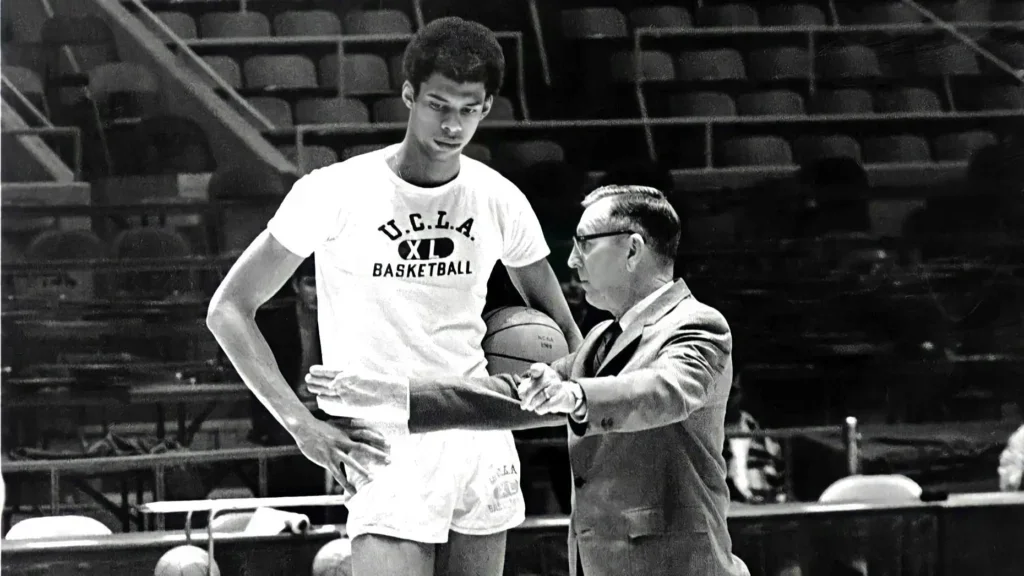 John Wooden coaching basketball