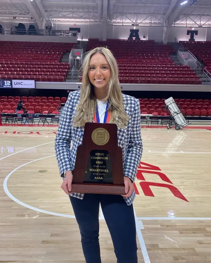 Shelby Martin-Parker holding state champion trophy