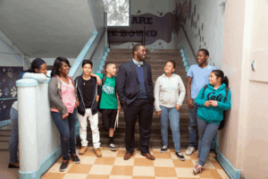Principal Orlando Johnson with students