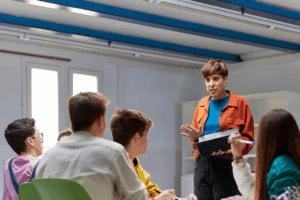 Student talking to group