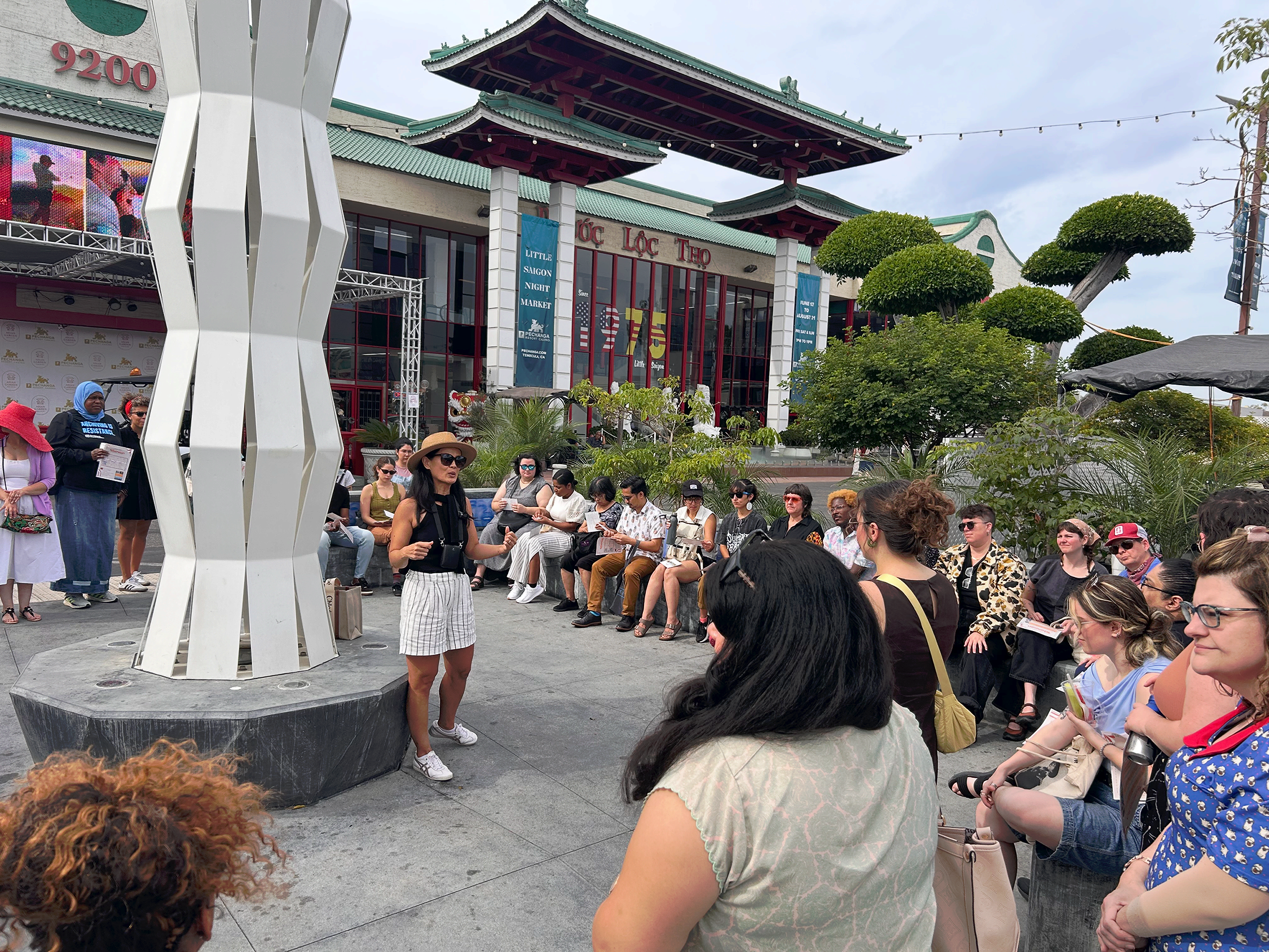 Thuy Vo Dang leading walking tour of Vietnamese historical sites.